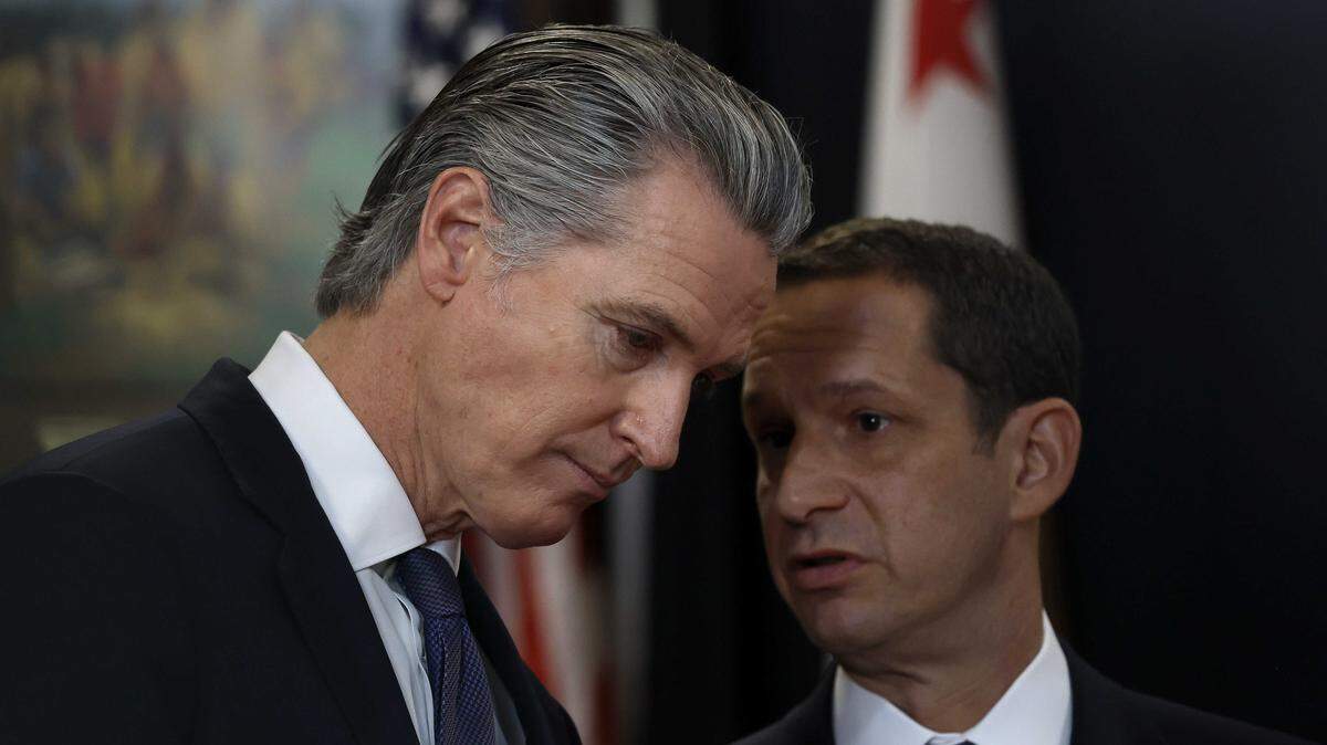 California Gov. Gavin Newsom, left, talks with San Francisco Mayor Daniel Lurie during a press conference at Friendship House Association of American Indians on Jan. 16, 2026, in San Francisco. Newsom has emerged as a vocal opponent of a proposed billionaire tax, warning it could degrade the state’s tax base if the ultrawealthy leave California.