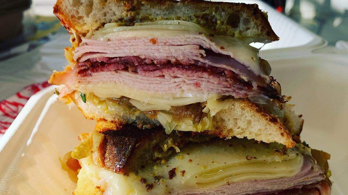 Lo/Fi’s “Reubenesque” sandwich features smoked pork loin, Swiss cheese, sauerkraut and caramelized onions on sourdough.