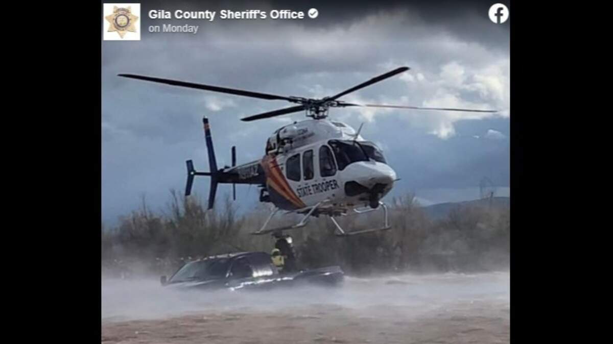 A driver had to be rescued after driving around flood barricades on Jan. 2 in Arizona, officials said.