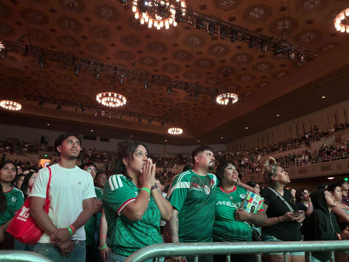 Amy Avila anxiously watches the final minutes of the Round of 32 match between Mexico and Ecuador at the Sacramento Republic FC’s watch party at Sacramento Memorial Auditorium on Tuesday.