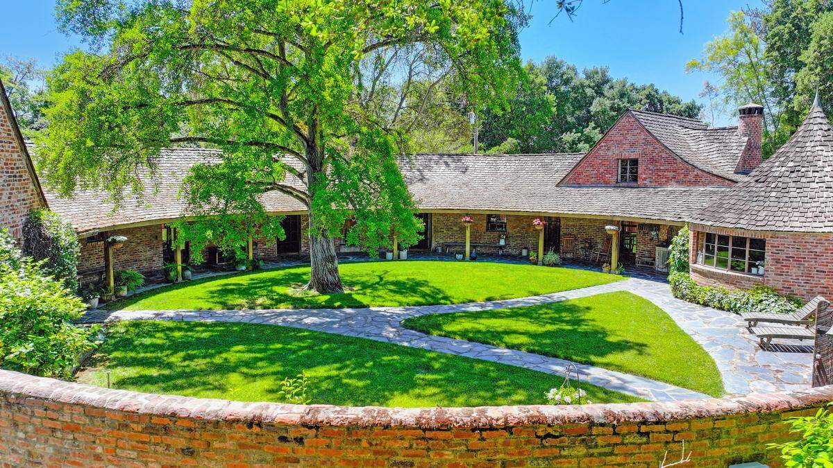 The circular courtyard and curved residence is the heart of the Walnut Grove property.