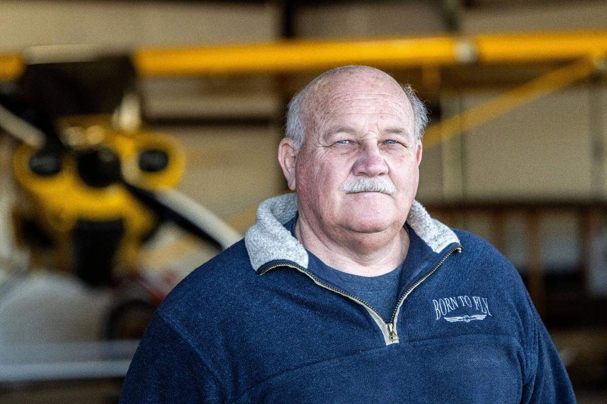 Pilot Gary Vorderbruggen, of Georgetown, talks on Friday about the dangerous conditions of trees at the Georgetown Airport. “The last four or five years has just been a shambles. We can’t get them to take care of the place up hear and the trees have grown exponentially,” Vorderbruggen said.