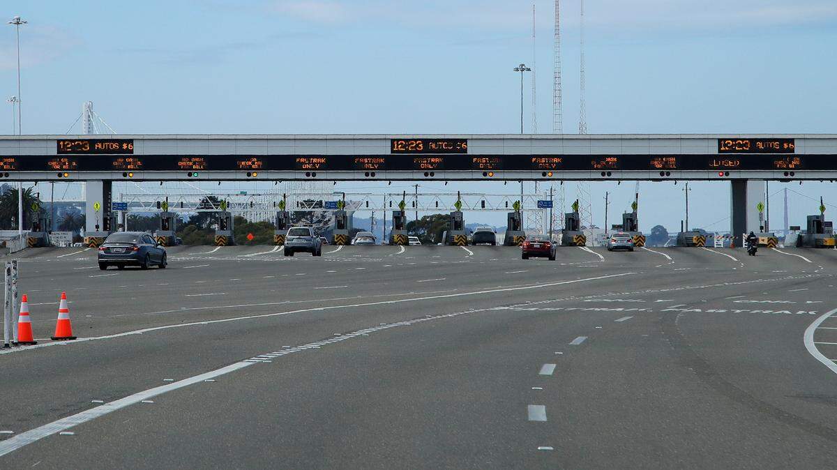 Motorists approach the toll plaza on the eastern span of the San Francisco-Oakland Bay Bridge on March 22, 2020. All tolls on Bay Area bridges will be electronic-only.