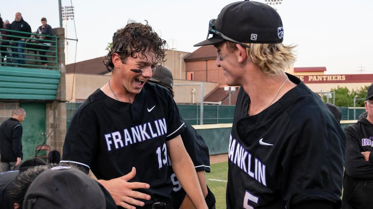 Franklin’s Nic Abraham (13) and Nolan Stevens (5) celebrate after winning the CIF Sac-Joaquin Section Division I high school baseball championship game against the Whitney Wildcats on Friday, May 26, 2023, at Sacramento City College.
