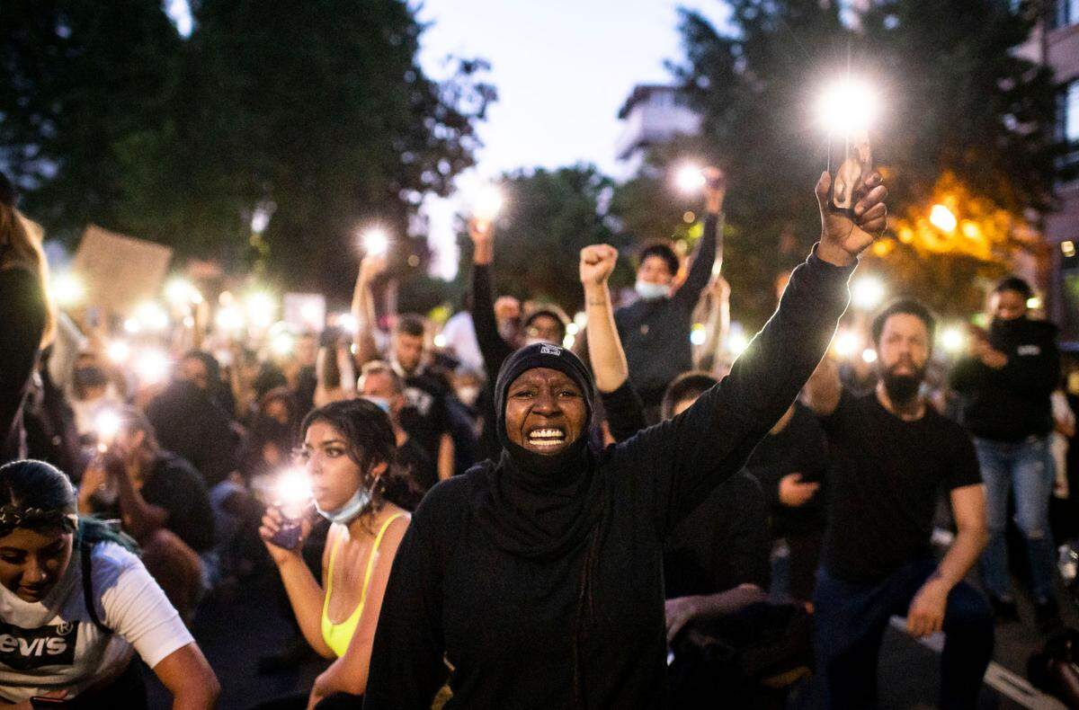 Musaqoi Young, of Sacramento, protests in front of City Hall on Monday, June 1, 2020, in Sacramento after days of heated demonstrations after the death of George Floyd, who was killed by police in Minneapolis on Memorial Day.