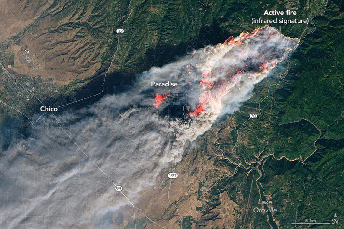 Satellite footage shows smoke and hot spots from the Camp Fire on Friday. Strong winds pushed smoke over the Sacramento Valley, causing air quality to diminish.
