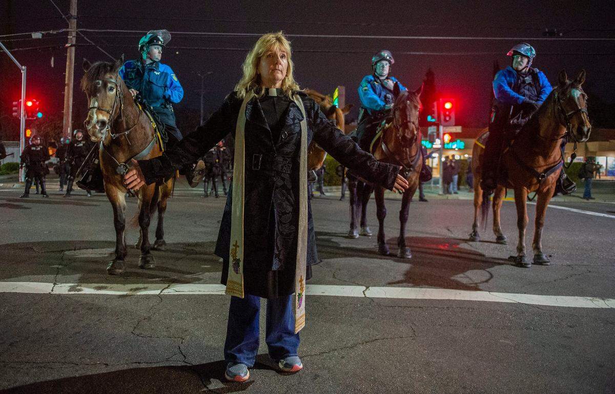 Rev. Pamela Anderson attempts to defuse a confrontation between protesters and Sacramento police during a Stephon Clark march on Folsom Boulevard in East Sacramento on Monday, March 4, 2019. The march ended with more than 80 people arrested.