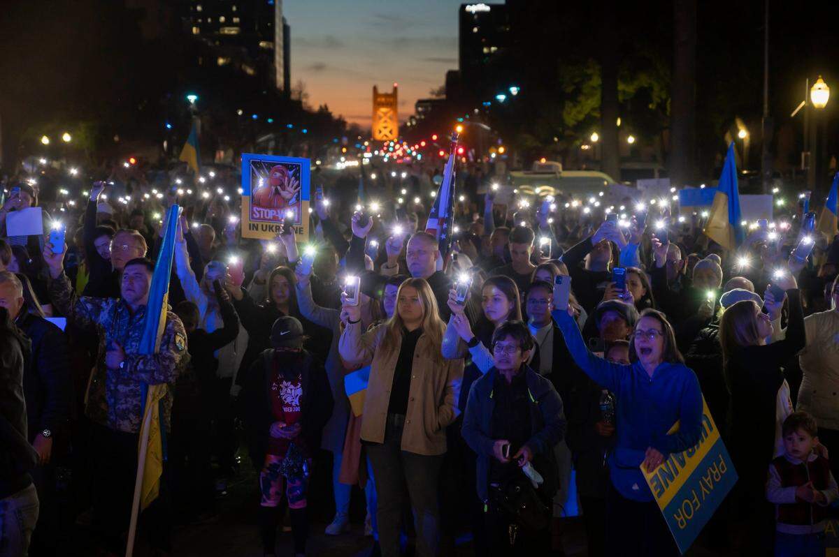 More than 1,000 protesters light up their cell phones for Ukraine during the prayer rally on Feb. 27 at the Capitol in Sacramento.
