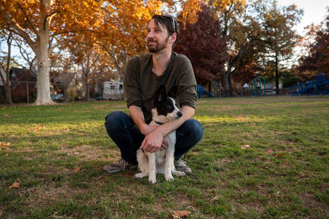 John Malin takes his border collie-poodle-pomeranian mix Toby out to socialize with other dogs at Sierra 2 Park in Curtis Park on Friday. The city of Sacramento plans to shut down off-leash dog use at the neighborhood park, but Malin doubts the policy will stick. “I have a hard time believing anybody’s gonna follow that.”