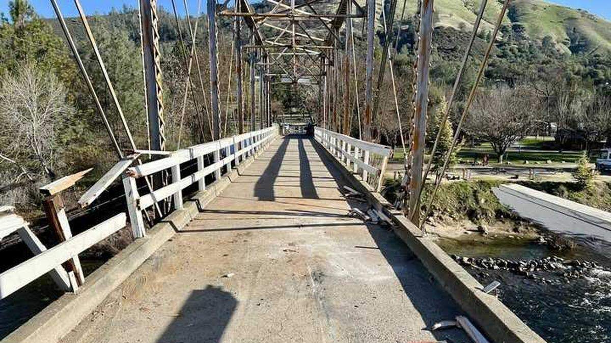 The historic Mt. Murphy Bridge, which crosses over the South Fork of the American River in Coloma, will remain closed indefinitely after a vehicle crash early Sunday Jan. 12, 2025, damaged the wood railing.