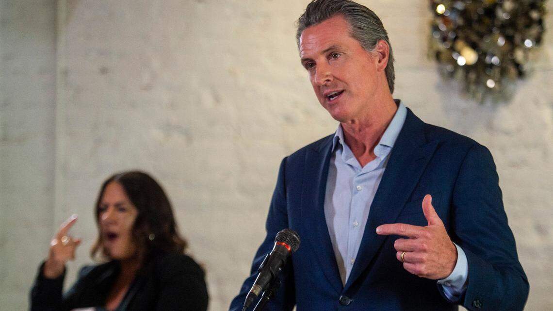 California Gov. Gavin Newsom speaks at a press conference at Solomon’s Delicatessen in Sacramento on Wednesday, Sept. 9, 2020. He was joined by Sen. Anna Caballero and signed two bills into law to support small businesses struggling with the impact of the COVID-19 pandemic and another to jumpstart state construction projects.