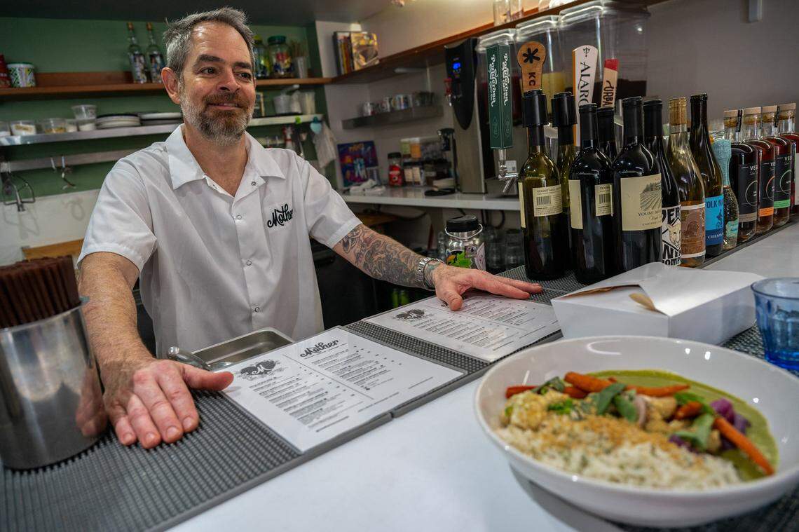 Robb Venditti, owner and chef at Mother, a vegetarian restaurant, serves one of his favorite dishes, Spring Thai Curry with cilantro rice, cauliflower, peas, carrots, red onion and toasted garlic, on Wednesday, April 8, 2026.