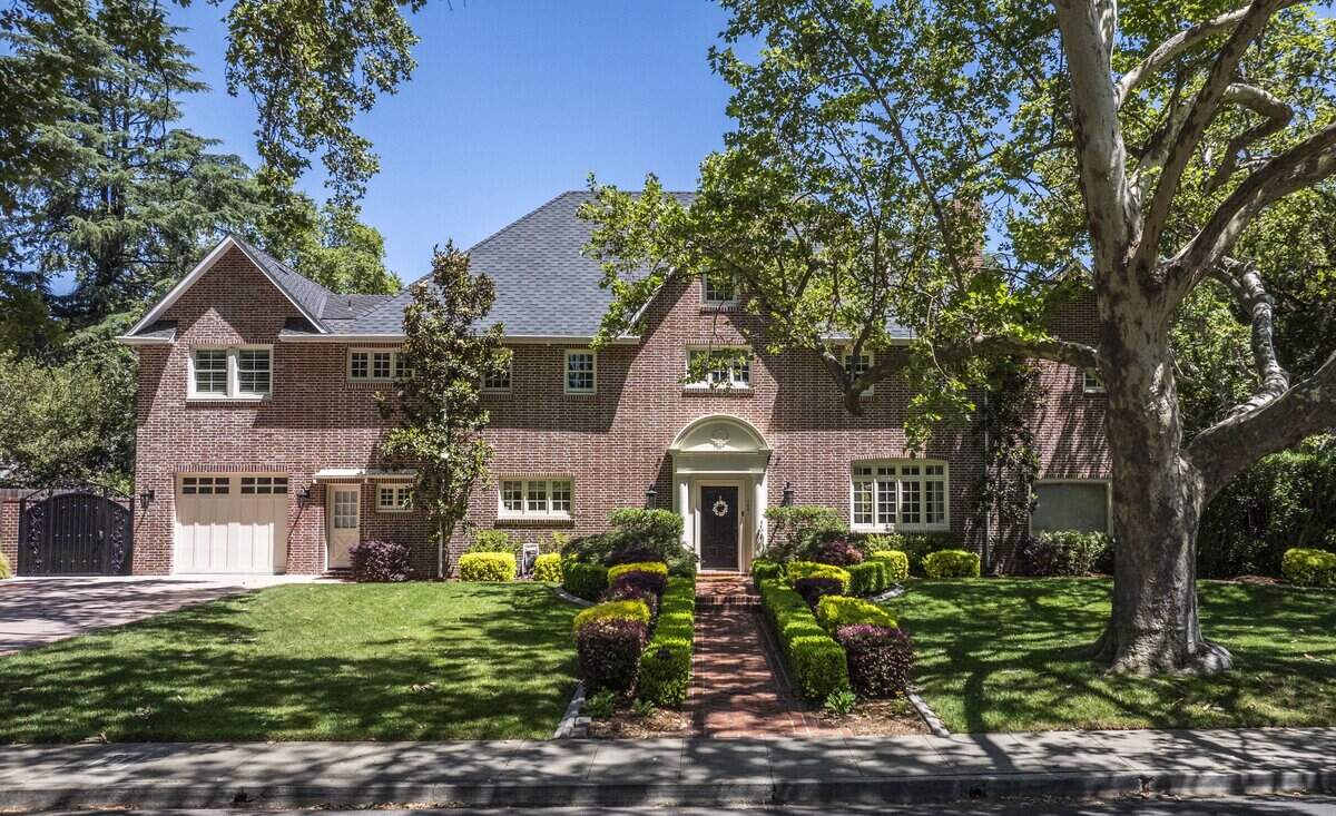 A renovated 1925 brick colonial in East Sacramento’s Fabulous 40s neighborhood spans 6,300 square feet with a ballroom, rooftop deck, pool and rich history. The property, listed for $4.2 million, is seen on Tuesday.
