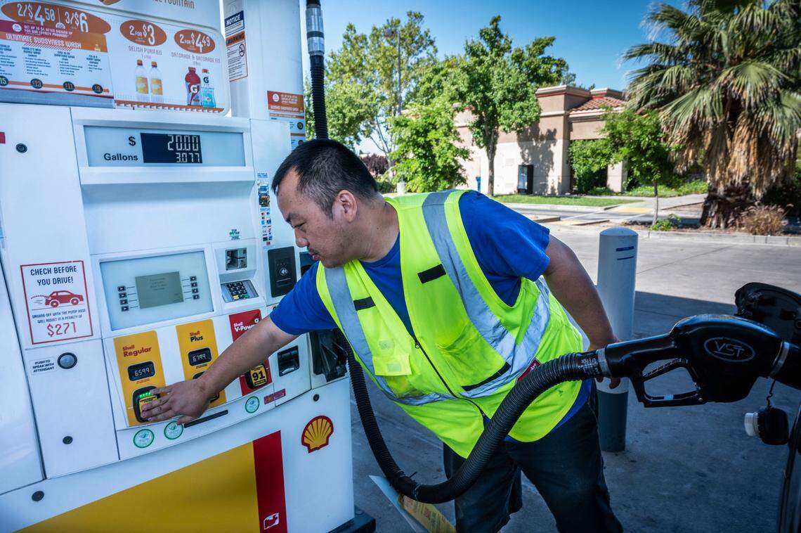 Sacramento resident Jay Lor pumps gas on Monday at the Shell station on Del Paso Road in North Natomas, where regular gas was at $6.59 a gallon. The price of regular in the Sacramento hit a new high over the weekend, reaching $6.44.