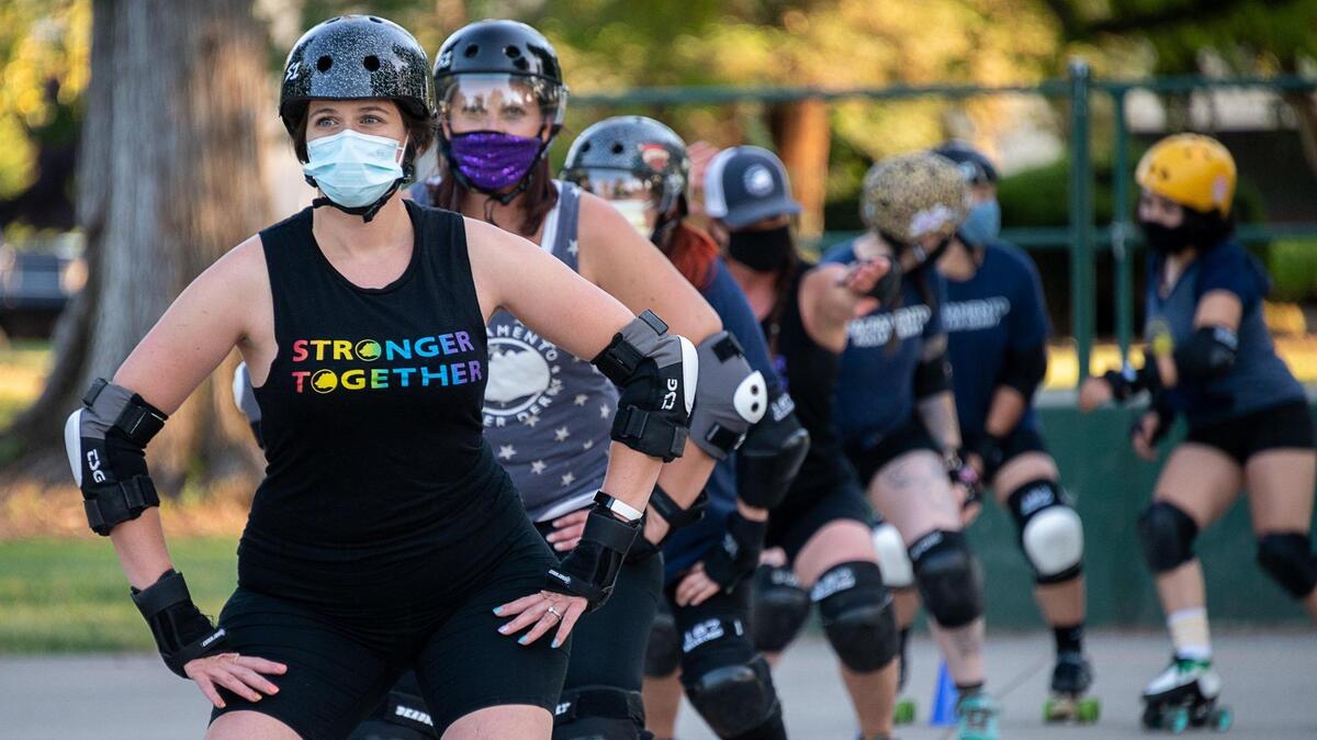 Sacramento Roller Derby Director of coaching Judith Licciardello “Rhodes Warrior” leads practice at Land Park on Monday, May 17, 2021, in Sacramento. The Sacramento Derby has a wide age group of skaters in the group.