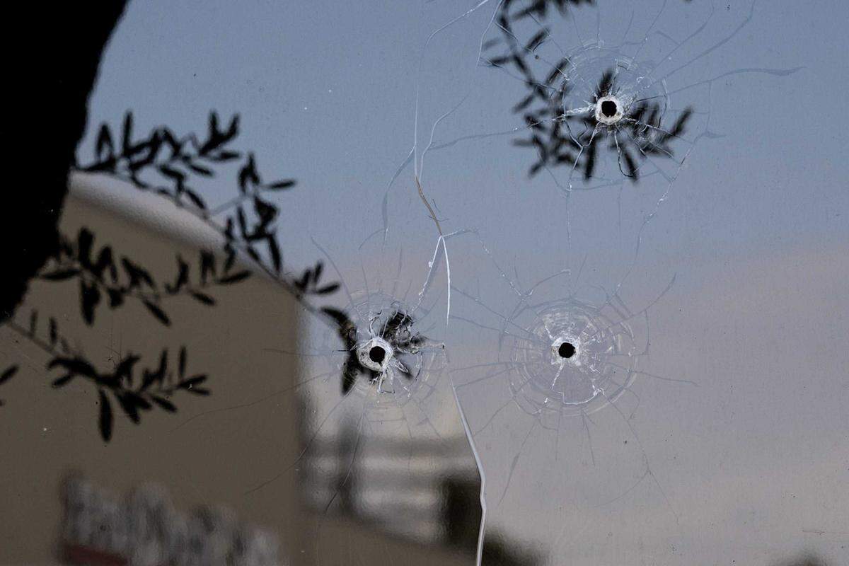 Three shots are visible in a window at the ABC10 offices in Upper Land Park on Friday, Sept. 19, 2025, in Sacramento. Police are investigating after gunfire struck the station one day after a protest over ABC’s suspension of “Jimmy Kimmel Live!” following remarks about the suspect charged in the murder of conservative activist Charlie Kirk.