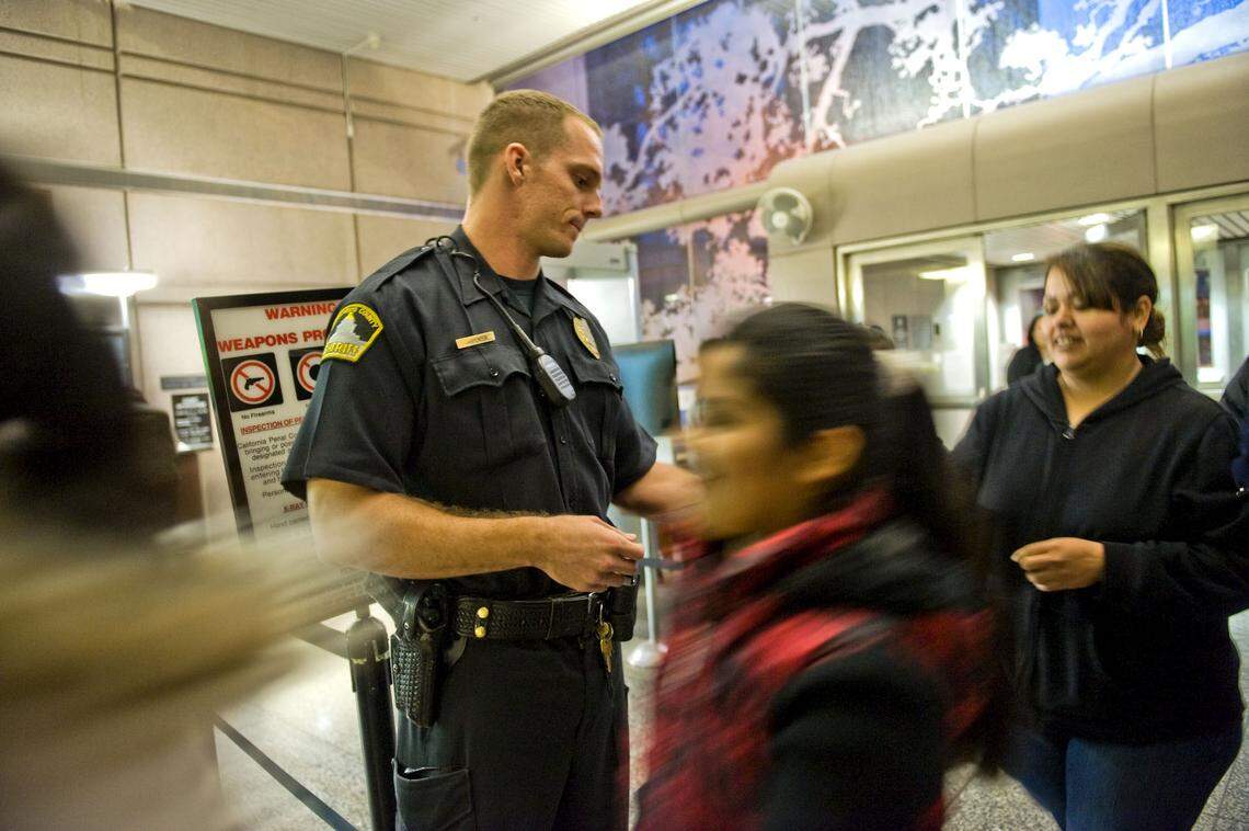 Sheriff’s deputy Matt Carpenter works security at the Sacramento County Main Jail on Feb. 23, 2010.