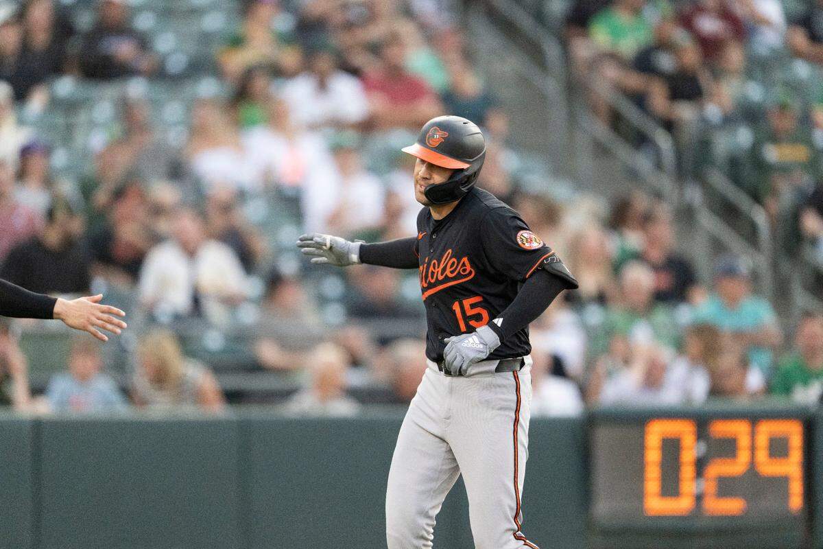 Baltimore Orioles outfielder Dylan Carlson (15) celebrates a home run as his team makes it’s first appearance at Sutter Health Park in West Sacramento against the Athletics on Friday. Carlson is a graduate of Elk Grove High School.