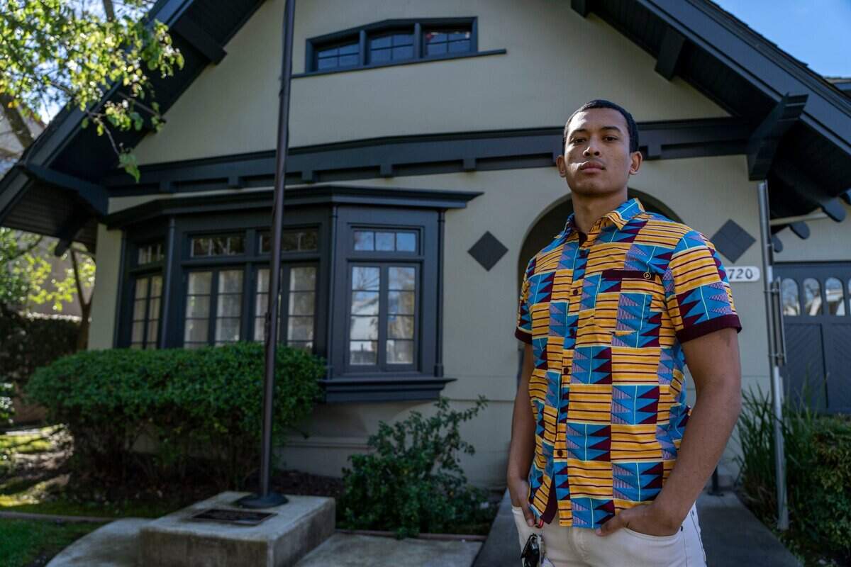 Former Sacramento firefighter Desmond Lewis stands in front of the Sacramento Area Fire Fighters Local 522 Union Hall on Saturday, March 6, 2021, in East Sacramento. Lewis recently left the Sacramento Fire Department, claiming racism within the department created a toxic work environment.