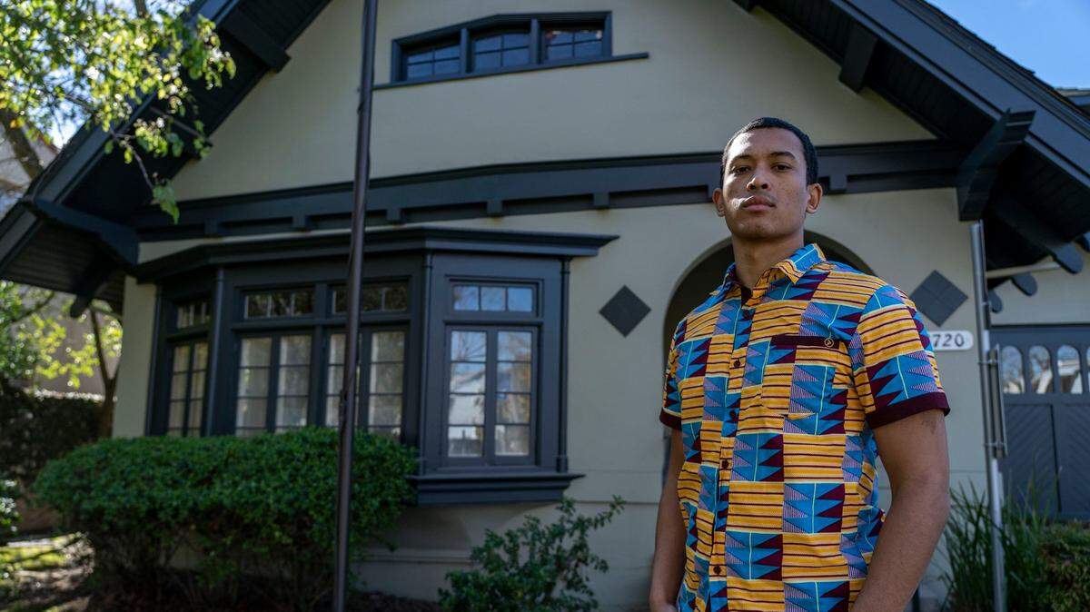 Former Sacramento firefighter Desmond Lewis stands in front of the Sacramento Area Fire Fighters Local 522 Union Hall on Saturday, March 6, 2021, in East Sacramento. Lewis recently left the Sacramento Fire Department, claiming racism within the department created a toxic work environment.