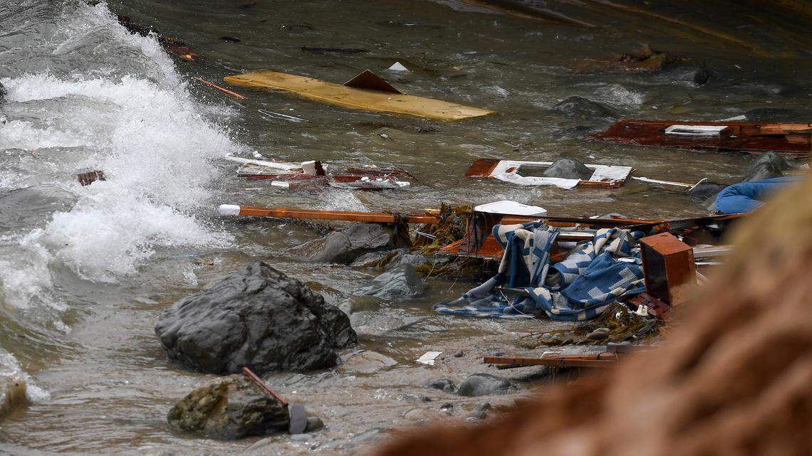 Wreckage and debris from a capsized boat washes ashore at Cabrillo National Monument near where a boat capsized just off the coast on May 2 in San Diego. Antonio Hurtado, who prosecutors said was the captain of the overloaded smuggling boat that crashed into rocks and broke up off the San Diego coast last year, killing three immigrants, pleaded guilty this week.