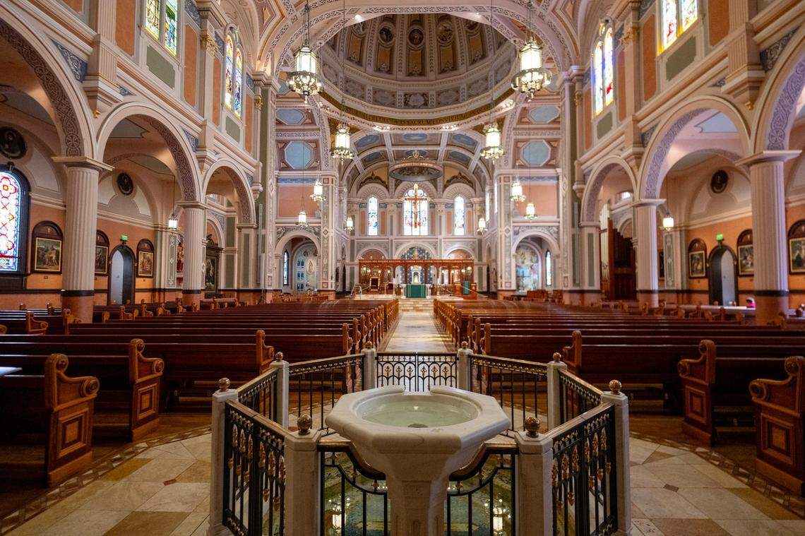 The baptismal bowl faces east from the entry of the church at the Cathedral of the Blessed Sacrament in downtown Sacramento. Once baptized, a new Catholic is welcomed by the church’s community.