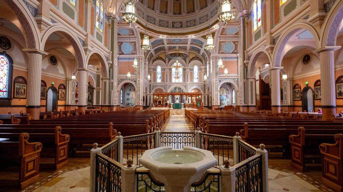 The baptismal bowl faces east from the entry of the church at the Cathedral of the Blessed Sacrament in downtown Sacramento. Can churches balance faith and politics?
