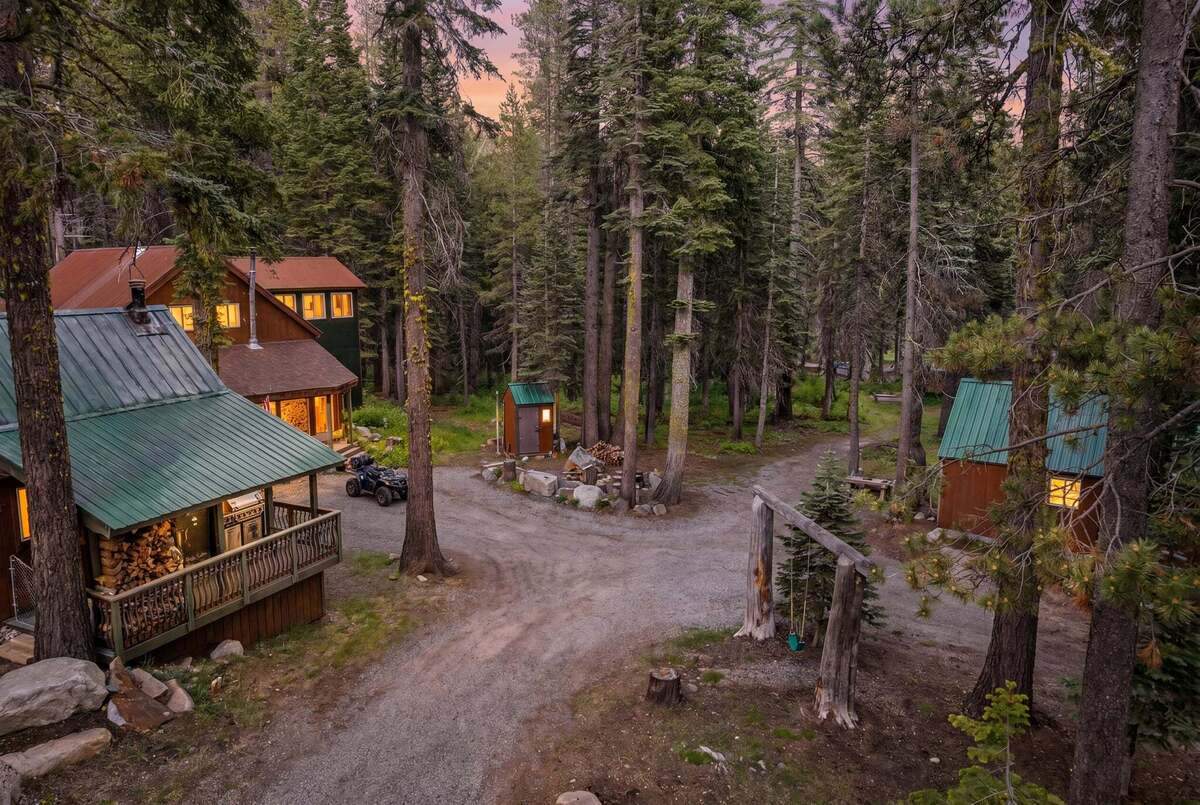 A quiet mountain compound near Sugar Bowl ski resort has hit the market for $1.3 million, offering 22 acres of privacy along a 1,000-foot stretch of the Yuba River.