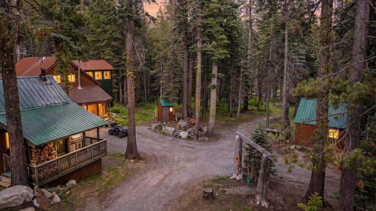 Off-grid, 22-acre Tahoe-area compound hugs Yuba River with fancy saloon inside