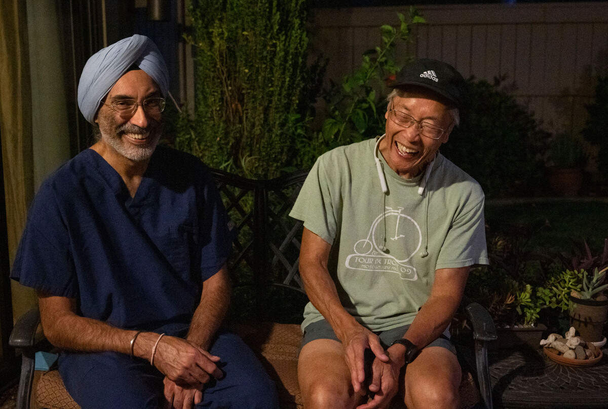 Dr. Karanjit Singh, left, a Dignity Health cardiologist, and William “Bill” Wong share a laugh in Gold River on Friday. They will be running the Urban Cow half-marathon on Sunday. Singh will be running with about 15 of his patients but the idea was birthed when he sought to help Wong, 71, gain more confidence in the health of his heart and offered to run with him.
