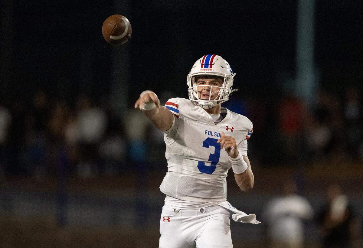 Folsom Bulldogs quarterback Ryder Lyons throws a pass against the Grant Pacers in the first half on Friday in Del Paso Heights.