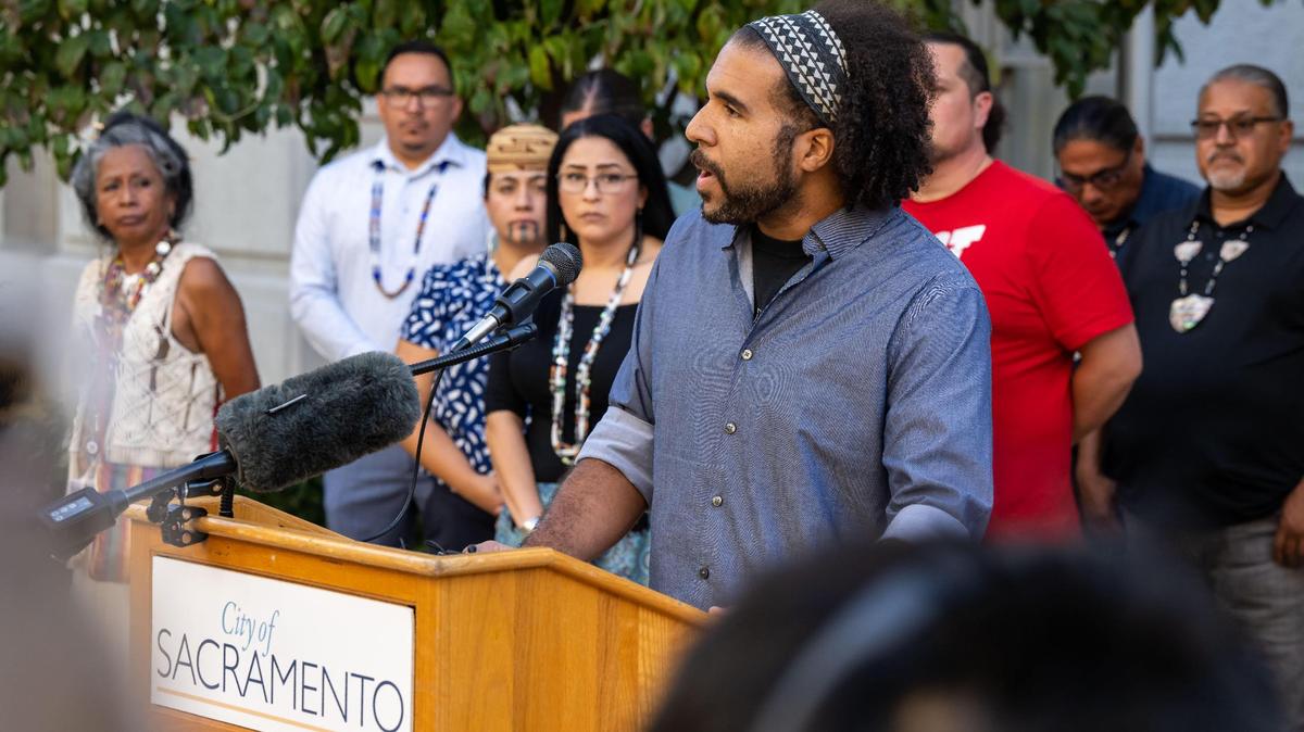 Sacramento Police Oversight Commissioner Keyan Bliss speaks during a 2022 press conference outside City Hall calling for a disciplinary censure for then-Councilman Jeff Harris.