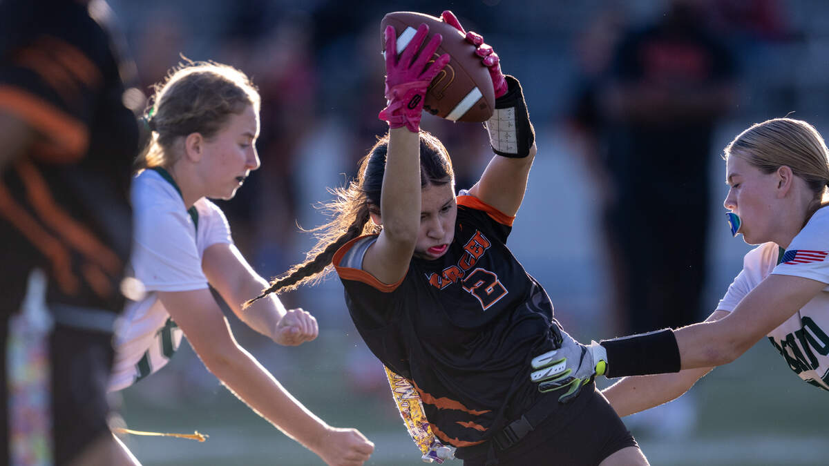 The Merced Bears' Alyssa Oseguera tries to split two defenders in the second half against the Ponderosa Bruins in the CIF Sac-Joaquin D ll Section Championship game on Saturday at Cosumnes River College in Sacramento.