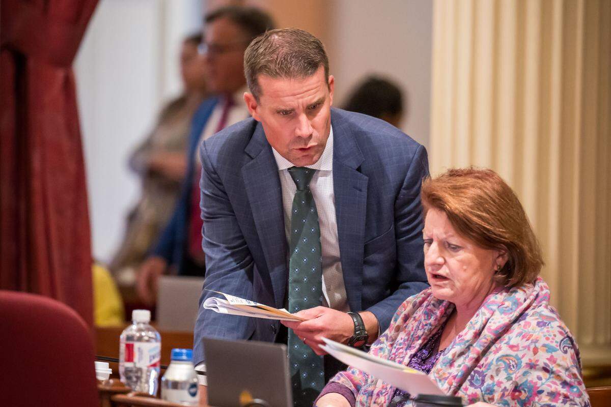 Senate Majority Leader Mike McGuire, D-Healdsburg, left, speaks with Senate President Pro Tem Toni Atkins, D-San Diego, in September 2023. McGuire becomes pro tem on Feb. 5.