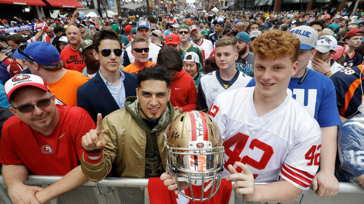 Fans prepare for the first round of the 2019 NFL draft Thursday in Nashville, Tenn.