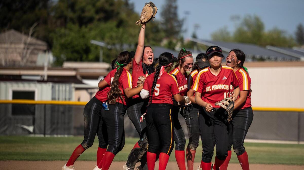 St. Francis cheers after winning in last year’s Sac-Joaquin Section playoffs. The team had a lot to celebrate in 2022, but the Sacramento-area softball scene is now topped by preseason No. 1 Granite Bay and No. 2 Whitney.