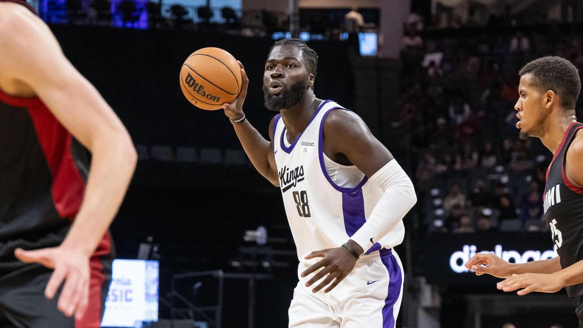 Sacramento Kings center Neemias Queta (88) looks for an open teammate as Miami Heat center Orlando Robinson (25) defends during the second half of their California Classic NBA summer league basketball game Wednesday, July 5, 2023, at Golden 1 Center.