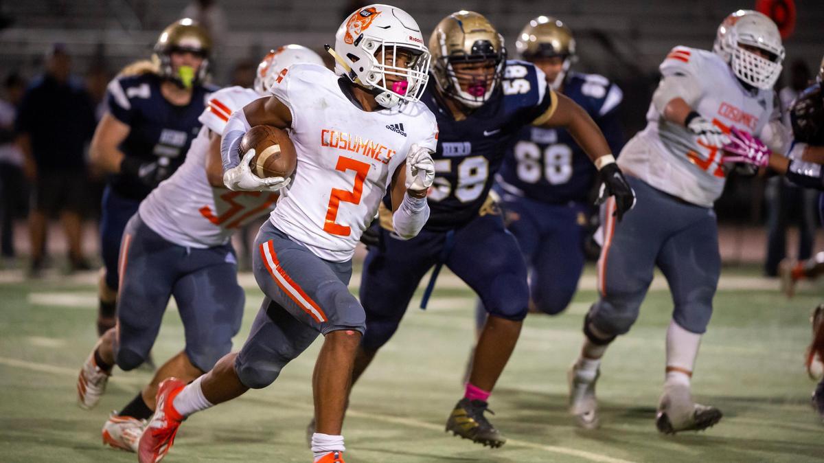 Cosumnes Oaks Wolfpack Branden Jennings (2), runs with the ball as the Elk Grove Thundering Herd host the Cosumnes Oaks Wolfpack at Elk Grove High School, Friday, Oct. 25, 2019.