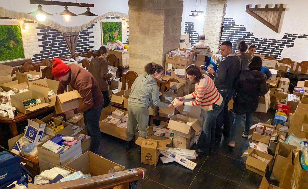Volunteers go through donated supplies stored in a restaurant in Ternopil, Ukraine weeks after the Russian invasion on Feb. 24. Dr. Liana Turkot, a Woodland-based physician for Dignity Health, was “shocked completely” by how the war transformed her homeland during a humanitarian mission last month.