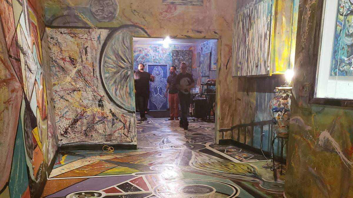 Visitors take in No One’s work during an August show in downtown Sacramento.