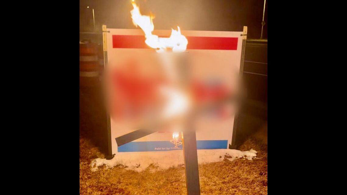 Three people are charged in connection with a hate crime hoax in Colorado, prosecutors say. The image pictured was included in court documents. It has been partly blurred because it shows a racial slur.