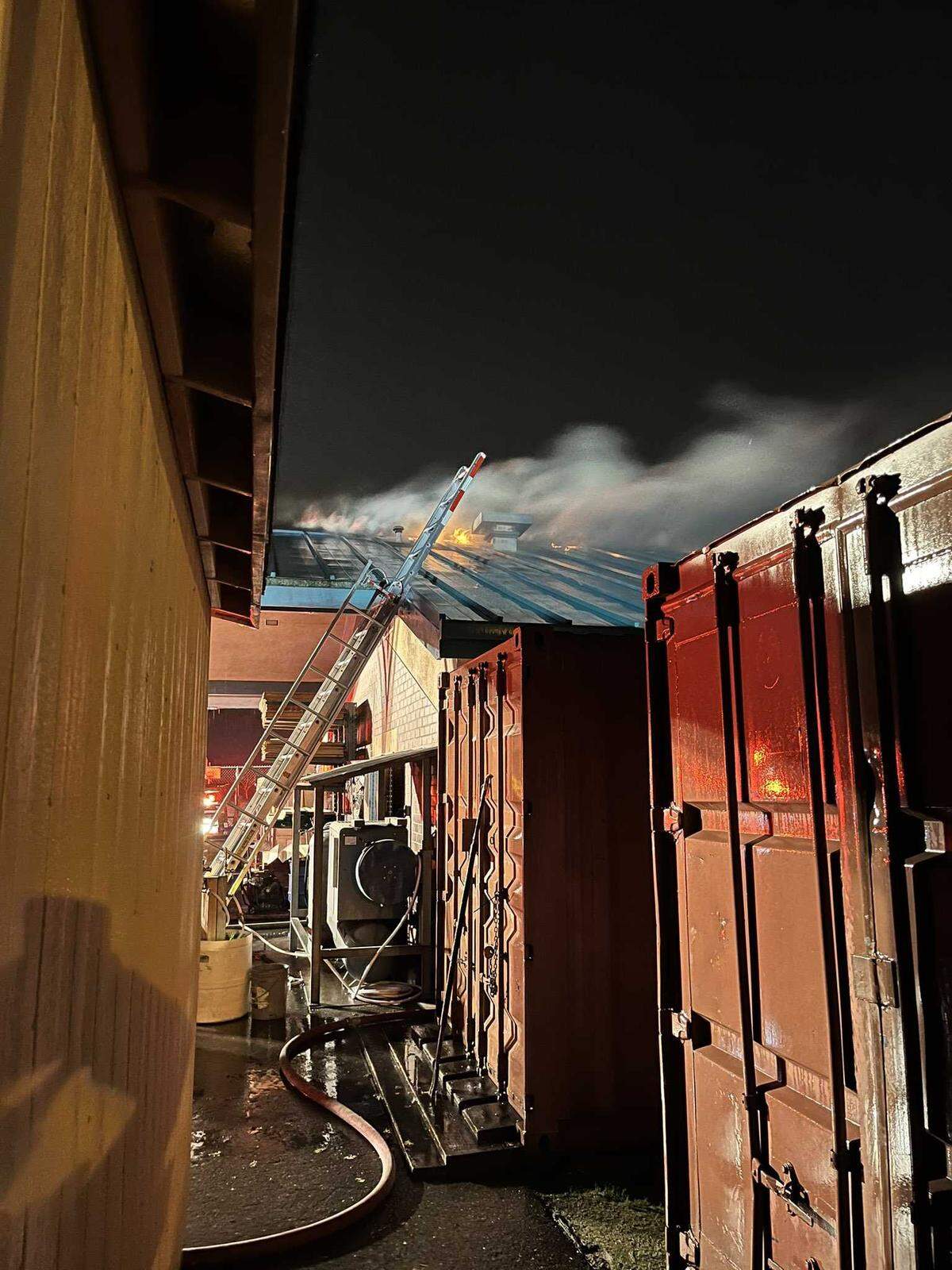 Sacramento Metropolitan Fire District crews respond to a two-alarm fire at the industrial arts building at Sheldon High School in the Vineyard area of Sacramento County on Monday, Dec. 13, 2021.