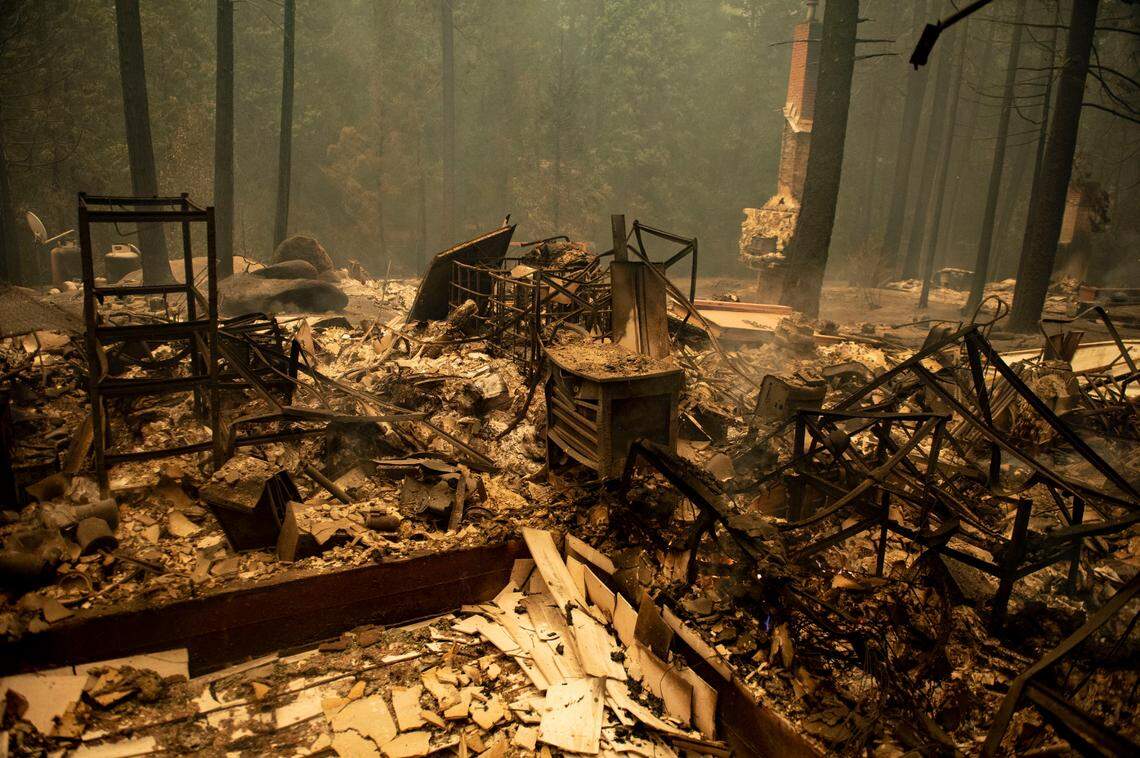 A home on Sugar Pine Drive in Berry Creek was burned during the Bear Fire near Oroville on Wednesday, Sept. 9, 2020. The blaze, part of the larger North Complex burning in Northern California, exploded in size Tuesday night and into Wednesday, forcing evacuation warnings and orders for at least 20,000 people in Butte County and reportedly inflicting widespread damage on the foothill community of Berry Creek.