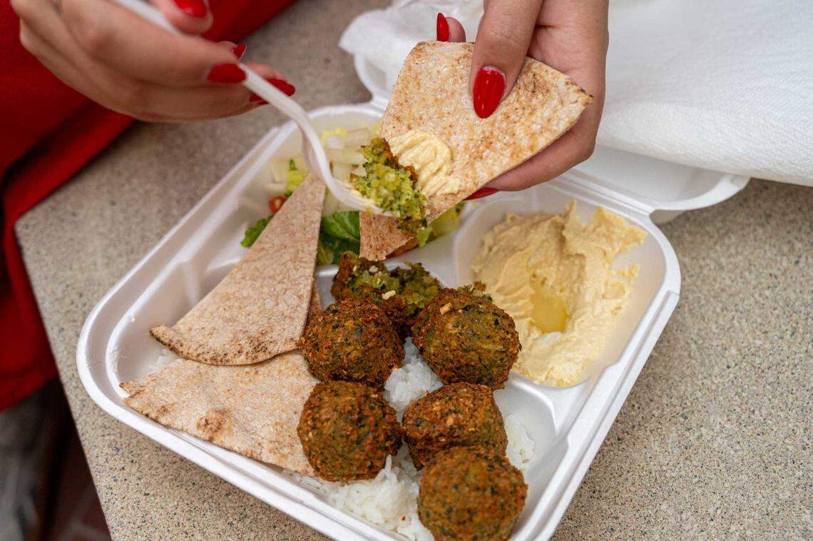 A falafel plate is available from Teze Grill at the California State Fair on Friday. The plate includes a salad, pita bread, rice, falafels and hummus.
