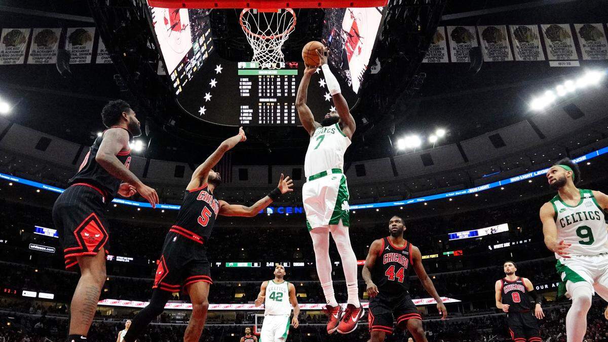 Boston Celtics guard Jaylen Brown (7) goes up for a shot against the Chicago Bulls during the second half of an NBA basketball game in Chicago, Wednesday, April 6, 2022. The Celtics won 117-94. (AP Photo/Nam Y. Huh)