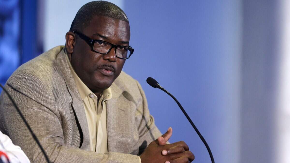 The Detroit Pistons President of Basketball Operations Joe Dumars is seen during a news conference at the Palace of Auburn Hills, Mich., where guard Brandon Jennings was introduced to the media, Tuesday, Aug. 6, 2013. Jennings comes from the Milwaukee Bucks, who acquired Brandon Knight, Slava Kravtsov and Khris Middleton in a sign-and-trade deal last week. Jennings signed a 3-year, $24-million deal as part of the deal. (AP Photo/Carlos Osorio)