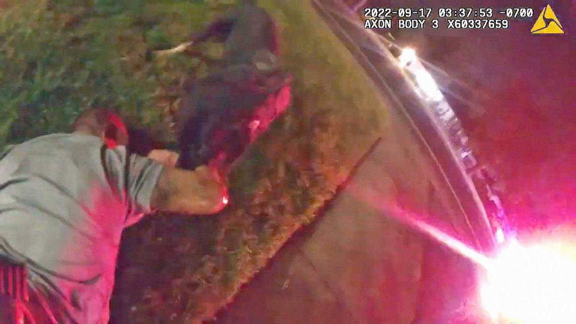 An image taken from bodyworn video, suspect Salvador Garcia Jr. is seen being subdued by a Sacramento County Sheriff’s Office K-9 at the Cypress Village Apartment Complex on Marconi Avenue in Arden Arcade on Sept. 17, 2022. Garcia is suing the county over his treatment by the dog and deputies.