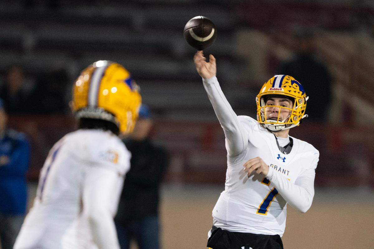 Grant Pacers quarterback Luke Alexander throws a pass in the CIF Sac-Joaquin Section Division II championship game against the Rocklin Thunder on Nov. 29 at Hughes Stadium in Sacramento.