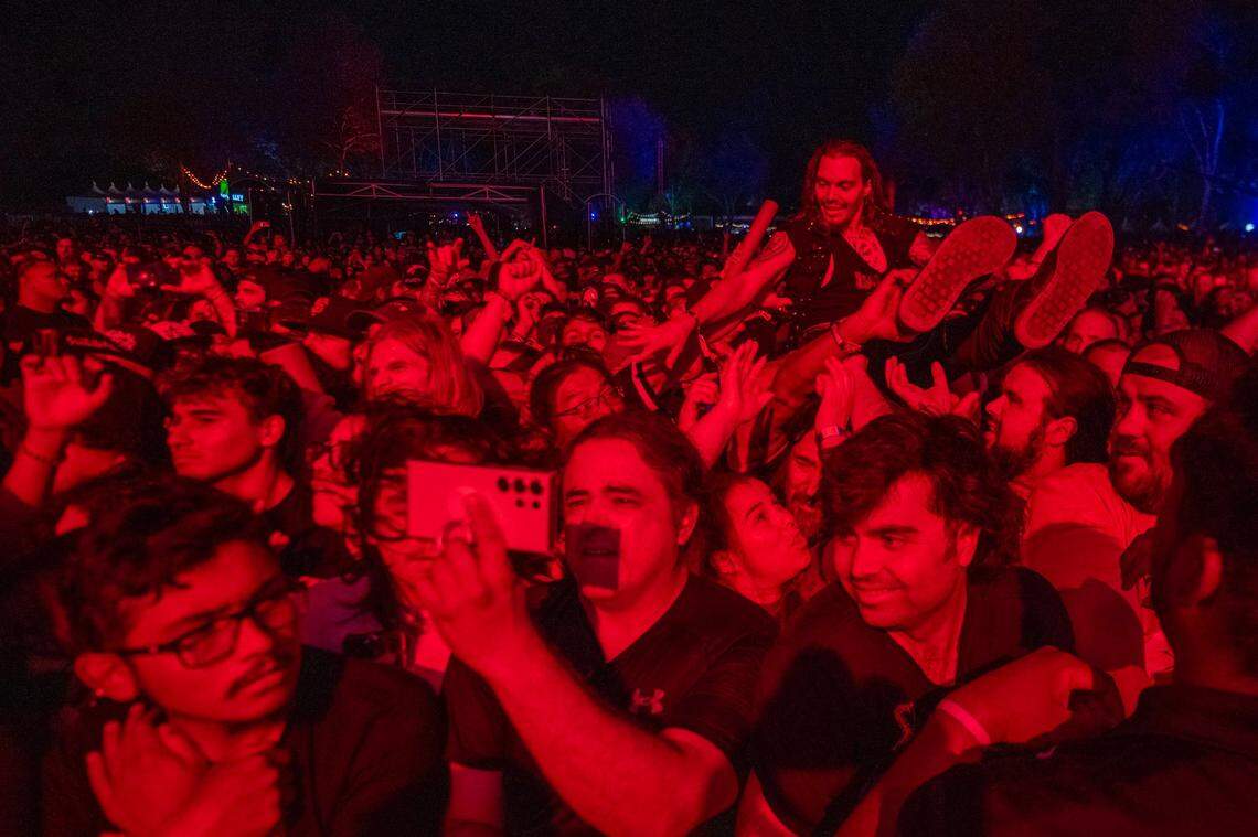 A Slayer fan crowd surfs in the first day of the Aftershock festival on Thursday, Oct. 10, 2024 at Discovery Park.