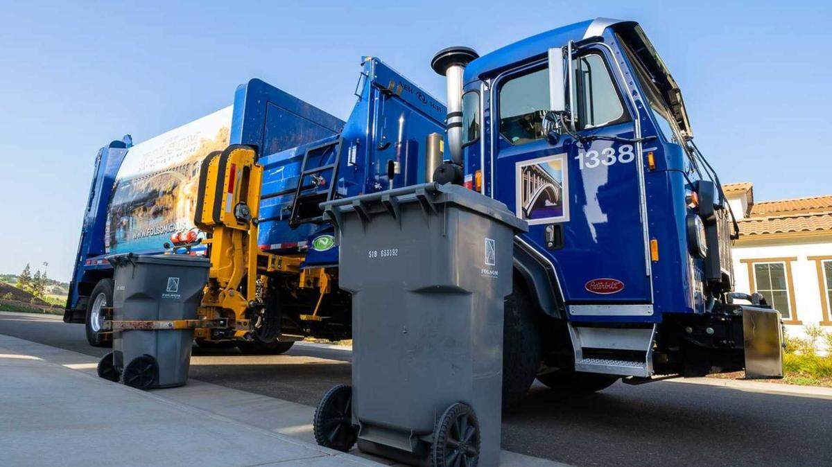 A Folsom garbage truck collects trash along a residential street in Folsom in 2024. Folsom City Council members on Tuesday declined to advance a proposed charter amendment that would have shifted authority over outsourcing city services, including solid waste collection, from voters to the council after residents urged them to reject the measure.
